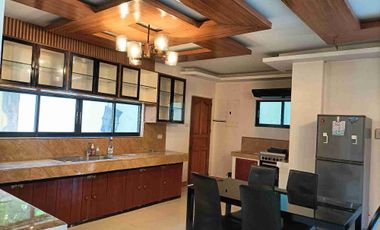 Single detached house with 6 bedrooms semi furnished inside Subd