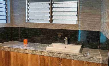 Single detached house with 6 bedrooms semi furnished inside Subd