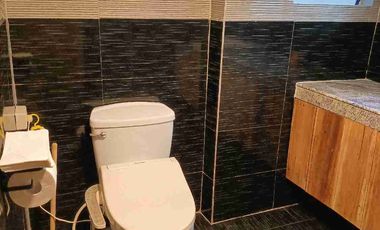 Single detached house with 6 bedrooms semi furnished inside Subd