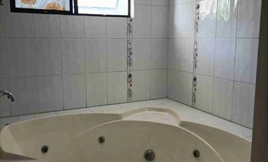 Single detached house with 6 bedrooms semi furnished inside Subd