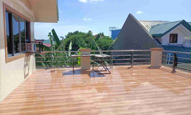 Single detached house with 6 bedrooms semi furnished inside Subd