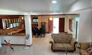 Single detached house with 6 bedrooms semi furnished inside Subd