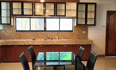 Single detached house with 6 bedrooms semi furnished inside Subd