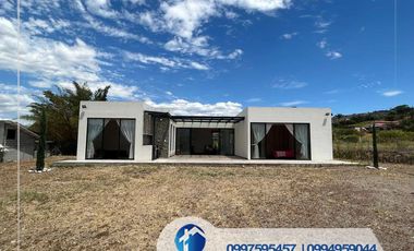 VENTA DE  PROPIEDAD EN  YUNGUILLA CON 1000m de terreno con casa por estrenar