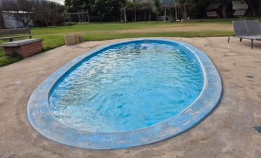 Exclusiva Parcela con 3 Casas, Piscina y Amplias Áreas Verdes en La Cruz – 5.060 m² de Terreno