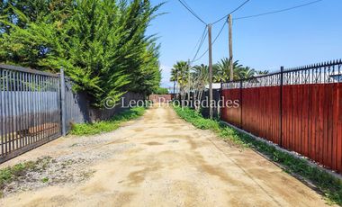 Leon Propiedades vende sitio con casa, en sector Lolenco, Curacaví.