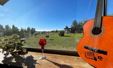 Vendemos Amplia parcela en el Batro de 5600 m2, posee casa, piscina, quincho y paltos, El Batro