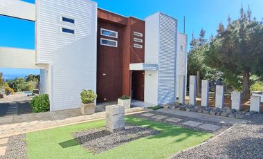 SINCRONICA PROPIEDADES ARRIENDA MARAVILLOSA PARCELA  CON VISTA AL MAR EN EXCLUSIVO CONDOMINIO DE TUNQUEN