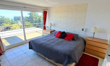 SINCRONICA PROPIEDADES ARRIENDA MARAVILLOSA PARCELA  CON VISTA AL MAR EN EXCLUSIVO CONDOMINIO DE TUNQUEN