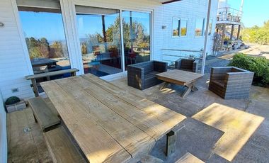 SINCRONICA PROPIEDADES ARRIENDA MARAVILLOSA PARCELA  CON VISTA AL MAR EN EXCLUSIVO CONDOMINIO DE TUNQUEN