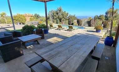 SINCRONICA PROPIEDADES ARRIENDA MARAVILLOSA PARCELA  CON VISTA AL MAR EN EXCLUSIVO CONDOMINIO DE TUNQUEN