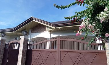 HOUSE AND LOT FOR SALE NEAR THE BEACH ID 15034