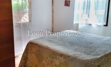 Leon Propiedades vende sitio con 3 casas a orillas de Ruta 68