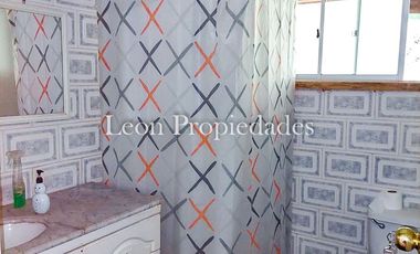 Leon Propiedades vende sitio con 3 casas a orillas de Ruta 68