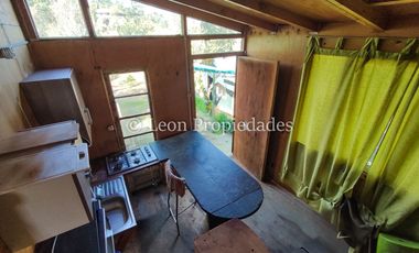 Leon Propiedades vende sitio con 3 casas a orillas de Ruta 68