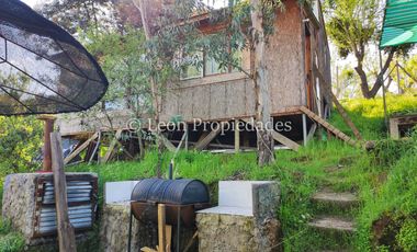 Leon Propiedades vende sitio con 3 casas a orillas de Ruta 68