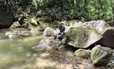 FINCA DE 30 HS CON RIO EN EL SECTOR DEL PARQUE TAYRONA SANTA MARTA.