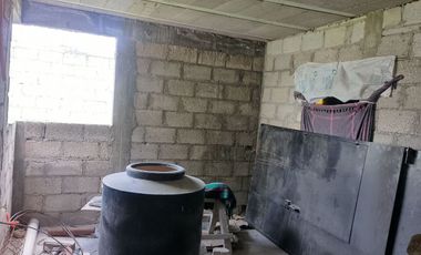 TERRENO CON CASA EN OBRA NEGRA EN PACHUQUILLA