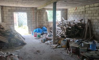TERRENO CON CASA EN OBRA NEGRA EN PACHUQUILLA