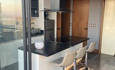 Rento precioso loft amueblado de 1 recamara en Torre Bagá zona Angelopolis y Tec. de Monterrey sobre Via Atlixcayotl cochera dos autos $15,000