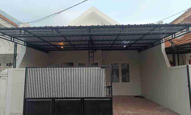 Rumah minimalis sudah renov berpagar di Nirwana Eksekutif dekat Merr