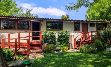 Leon Propiedades vende hermosa parcela con casa en sector Lo Águila , Curacaví.