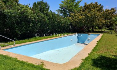 Leon Propiedades vende hermosa parcela con casa en sector Lo Águila , Curacaví.