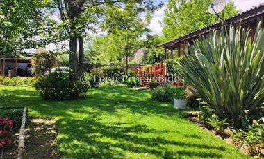 Leon Propiedades vende hermosa parcela con casa en sector Lo Águila , Curacaví.