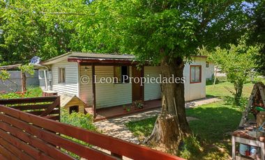 Leon Propiedades vende hermosa parcela con casa en sector Lo Águila , Curacaví.