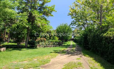 Leon Propiedades vende hermosa parcela con casa en sector Lo Águila , Curacaví.