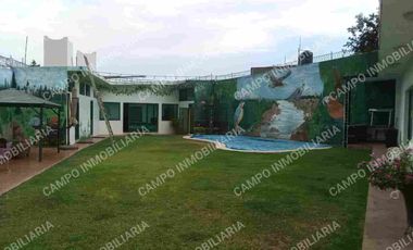 RENTA OCOTEPEC CASA CON ALBERCA CLIMATIZADA, PRIVADA CON DOBLE PORTÓN ELÉCTRICO PARA ACCESO.