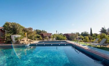 VENDO PARCELA CON 8 CABAÑAS EN  CONDOMINIO ALGARROBO