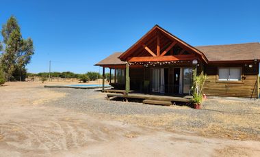 Se vende Parcela con hermosa casa en Marchigue