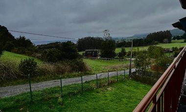 Parcela con propiedad y dos cabañas