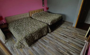 Parcela con propiedad y dos cabañas