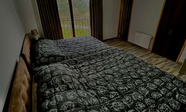 Parcela con propiedad y dos cabañas