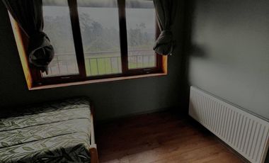 Parcela con propiedad y dos cabañas