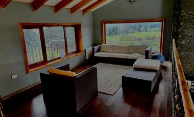 Parcela con propiedad y dos cabañas