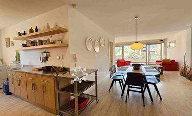 EN VENTA - AMPLIA DEPARTAMENTO CON TERRAZA Y VISTA ESPECTACULAR DE LAS MONTAÑAS, CON 1 DORMITORIO