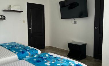 Propiedad con Hotel, local comercial y Parqueadero en el centro de Santa Rosa