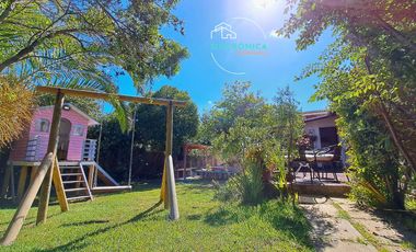 SINCRONICA PROPIEDADES VENDE HERMOSA CASA CON ESPECTACULAR JARDIN EN EL CANELO, ALGARROBO