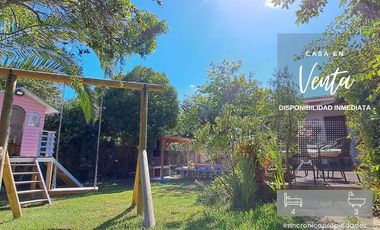 SINCRONICA PROPIEDADES VENDE HERMOSA CASA CON ESPECTACULAR JARDIN EN EL CANELO, ALGARROBO