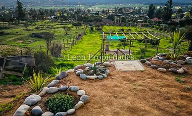 Leon Propiedades vende Parcela con casa en El Pangal, sector Alhué, Curacaví.