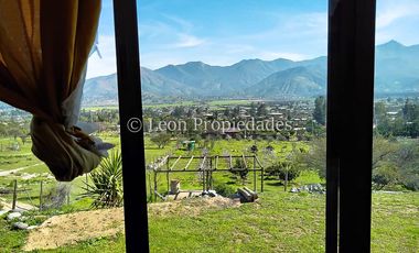 Leon Propiedades vende Parcela con casa en El Pangal, sector Alhué, Curacaví.