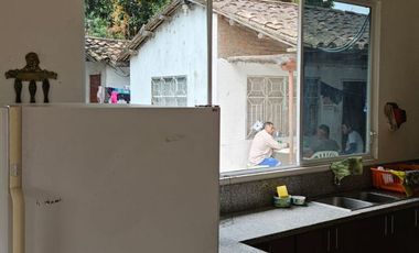 TERRENO CON CASAS EN VENTA EN CATAMAYO