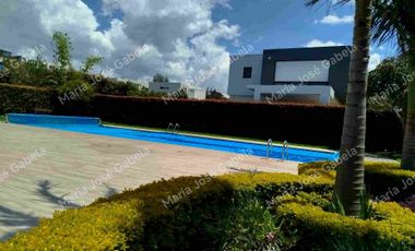 VENTA TERRENO 1010m² BIFAMILIAR  DENTRO DE URBANIZACIÓN DE PRIMERA EN PUEMBO