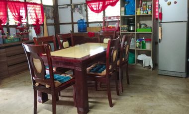 Fenced Property With Native House