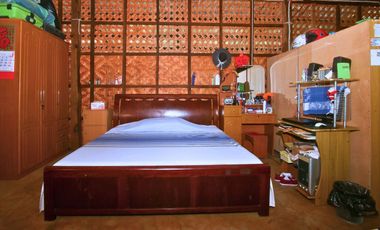 Fenced Property With Native House