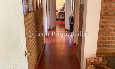 Leon Propiedades vende hermosa parcela con casa en Sector Zapata, Curacaví.
