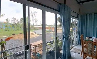 House and land, Baan Suan Mai Ngam Project, Khlong 15, with mixed garden, sprinkler system, have water and electricity.